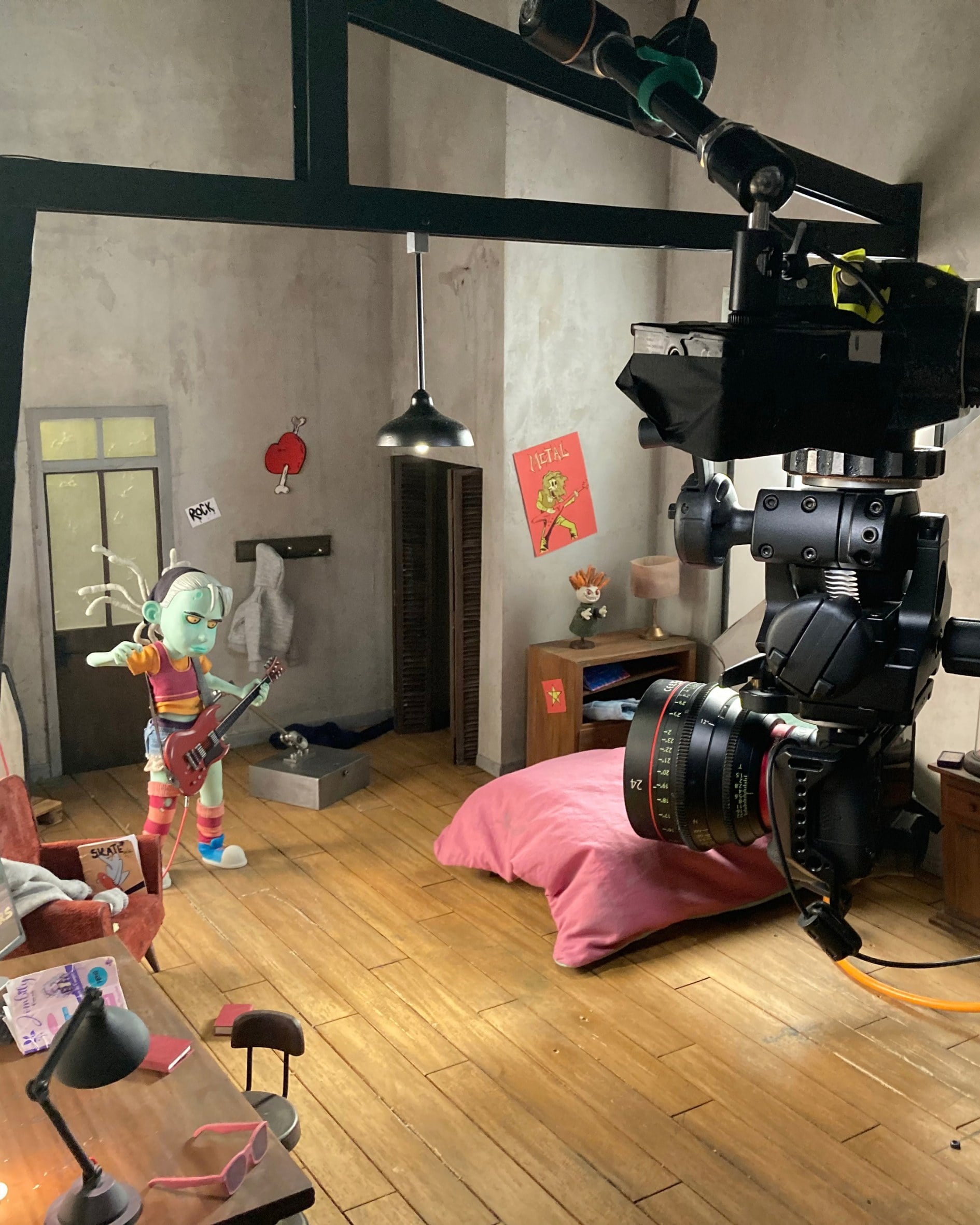 The miniature set of Zoé's bedroom, with the film camera in the foreground